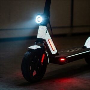 Street Legal Electric Scooter detailed view of essential safety features, including bright headlights and reflective elements.
