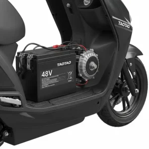 Detailed view of the 48V battery pack and electric motor on a TaoTao scooter, highlighting its power system.