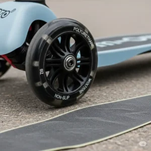 Close-up view of the durable polyurethane wheels and non-slip deck of a micro scooter mini, highlighting its quality construction for safe and smooth rides.