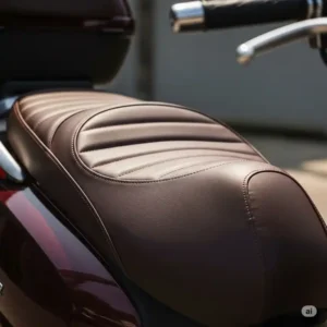 Close-up of a premium scooter seat, showcasing its padded design and durable material for enhanced rider comfort.