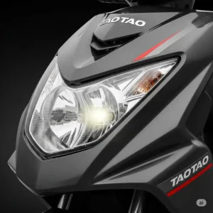 Detailed view of the bright, energy-efficient headlight on a TaoTao scooter, ensuring visibility.