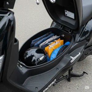 Under-seat storage compartment of a TaoTao 48V scooter, demonstrating practical space for personal items.