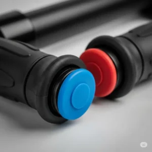 Close-up of scooter bar ends and plugs, providing protection to the handlebars and rider.