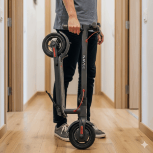  A folded Navee electric scooter with a person holding it by the stem, demonstrating its compact size and easy storage.