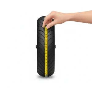 Hand holding a measuring tape against a scooter tire, demonstrating how to confirm a 10 inch scooter tire size. 