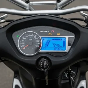 Dashboard of an Italika scooter, showing the speedometer and digital display. 