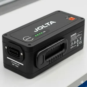 A detailed photo of the removable lithium-ion battery pack for the Jolta electric scooter.