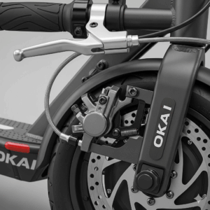 A detailed view of the braking system on an Okai e-scooter, highlighting its safety features and durable build.