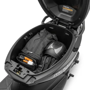 Under-seat storage compartment of an Italika scooter, highlighting its practicality. 